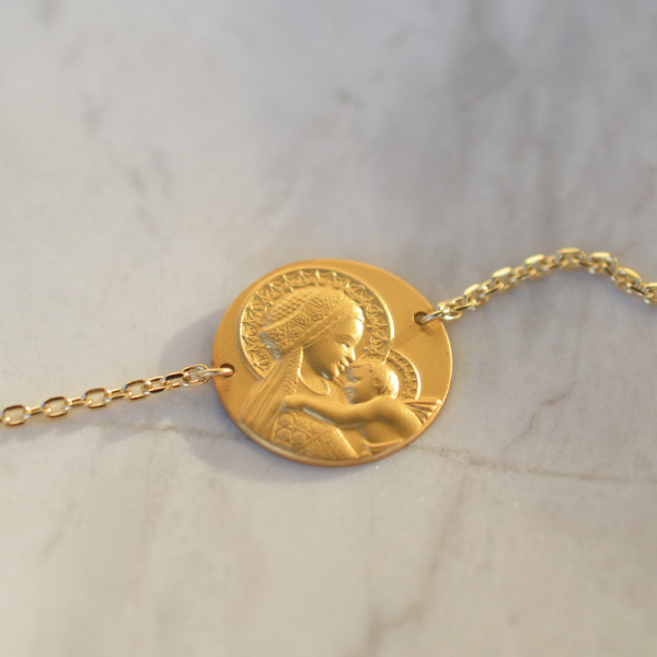 https://www.laudate.fr/bracelet-medaille/1441-bracelet-medaille-douce-mere-18ct-3-65gr-1478416092107.html