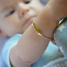 Gourmette bébé ovale avec chaine mailles plates en or jaune 18 carats