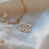 Croix Solidarité évidée en or jaune 18 carats - Maison Laudate