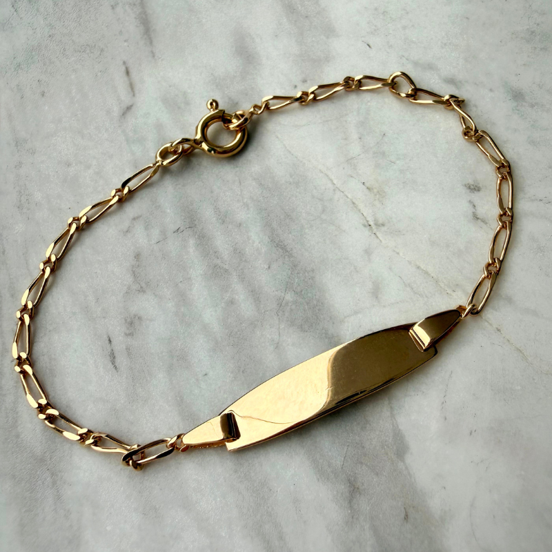 Gourmette bébé ovale - maille alternée or 9 carats
