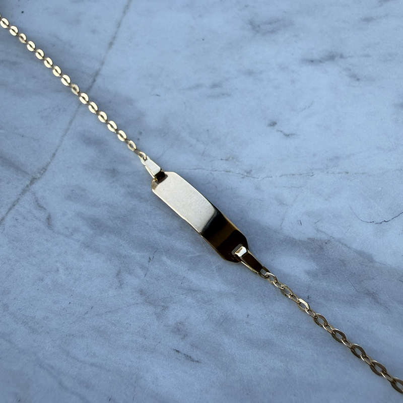 Gourmette bébé rectangle forçat miroir or 18 carats